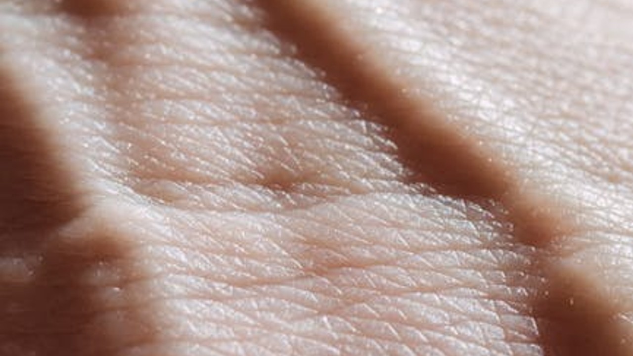 Close-up of healthy, glowing skin with subtle texture